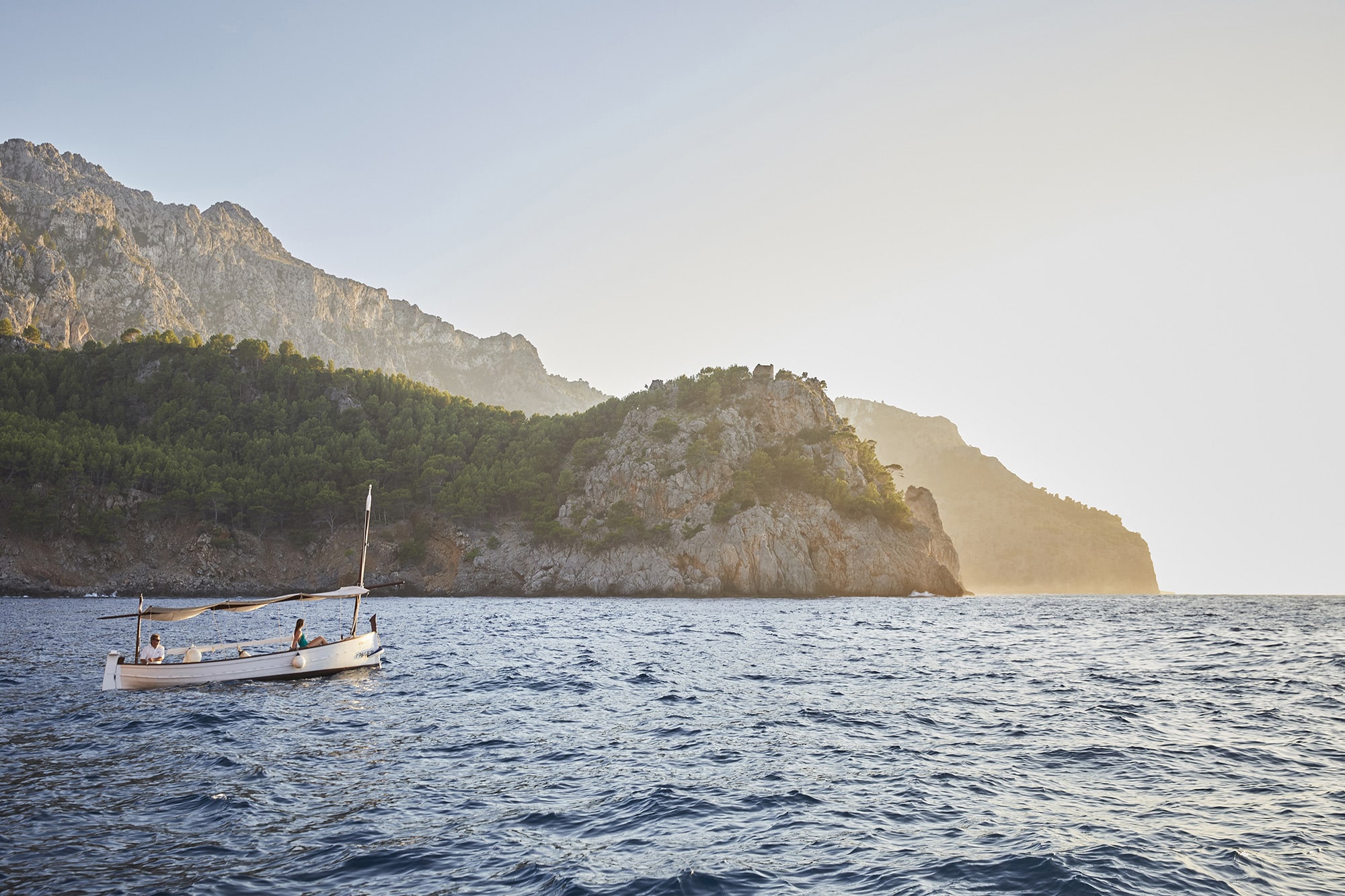Boating along the northern Mallorca coastline for Belmond La Residencia. Photography by Tyson Sadlo